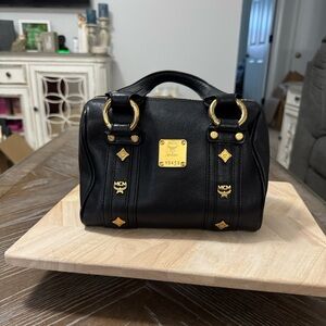 MCM Black Satchel with Gold Accents